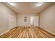 Neutral bedroom with wood floors and closet at 2300 Kate Moore Way, Buford, GA 30518