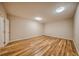 Neutral bedroom with wood floors and good light at 2300 Kate Moore Way, Buford, GA 30518