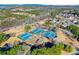 Aerial view of the community featuring tennis courts and surrounding greenery at 232 Providence Ln, Canton, GA 30114