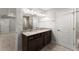 Bathroom featuring a granite double sink vanity, tile flooring, and a separate tiled shower enclosure at 232 Providence Ln, Canton, GA 30114