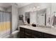 Bathroom features double sinks with granite countertops and a large mirror at 232 Providence Ln, Canton, GA 30114