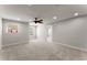 Spacious bedroom with plush carpeting, a ceiling fan, and lots of natural light at 232 Providence Ln, Canton, GA 30114