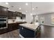 Modern kitchen with stainless steel appliances, granite countertops, and a center island at 232 Providence Ln, Canton, GA 30114