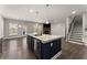 Spacious living room with a fireplace, hardwood floors, and natural light at 232 Providence Ln, Canton, GA 30114