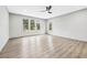 Bright bedroom featuring wood-look flooring, neutral walls, and large windows, creating a serene and inviting retreat at 3139 Alston Dr, Decatur, GA 30032