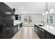 Bright modern kitchen featuring a central island, stainless steel appliances, and ample counter space at 3139 Alston Dr, Decatur, GA 30032