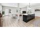 This view shows an open-concept living room with a modern kitchen and center island at 3139 Alston Dr, Decatur, GA 30032