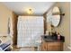 Traditional bathroom with pedestal sink, shower with curtain, and decorative mirror at 7452 Mount Vernon Rd, Lithia Springs, GA 30122