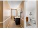 Bright bathroom with decorative tile, modern fixtures, and a granite vanity at 7452 Mount Vernon Rd, Lithia Springs, GA 30122