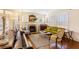 Bright living room featuring hardwood floors, a fireplace, and large windows at 7452 Mount Vernon Rd, Lithia Springs, GA 30122