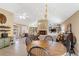 Inviting living room featuring a fireplace, built-in bookshelves, and an adjacent dining area, perfect for entertaining at 7452 Mount Vernon Rd, Lithia Springs, GA 30122