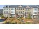 Aerial view of modern townhomes with well-maintained landscaping and walking paths at 146 Rowan Ave, Alpharetta, GA 30009