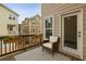 Charming balcony with comfortable seating and views of the surrounding neighborhood at 146 Rowan Ave, Alpharetta, GA 30009