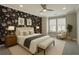 Charming bedroom with floral wallpaper, neutral furniture, and large windows for natural light at 146 Rowan Ave, Alpharetta, GA 30009