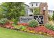 Entrance sign to the Braeden community, surrounded by colorful landscaping at 146 Rowan Ave, Alpharetta, GA 30009