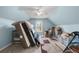 Bedroom with sloped ceilings and window, currently being used for storage at 159 Sequoyah Cir, Canton, GA 30115