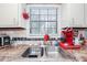 A kitchen sink next to a window with great natural light at 3661 Silver Leaf Sw Ln, Marietta, GA 30008
