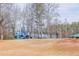 Community playground on a hill features a variety of play equipment for children of all ages at 3661 Silver Leaf Sw Ln, Marietta, GA 30008