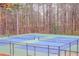 Community tennis courts fenced in and ready for a match at 3661 Silver Leaf Sw Ln, Marietta, GA 30008