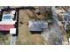 Aerial view of home and backyard, featuring a pool on the property at 4749 Cox Se St, Acworth, GA 30101