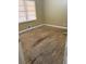 Bedroom has hardwood floors and a window for natural light at 4749 Cox Se St, Acworth, GA 30101
