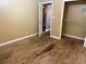 This bedroom offers hardwood floors and closet at 4749 Cox Se St, Acworth, GA 30101