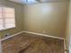 Standard bedroom with hardwood floors and a window for natural light at 4749 Cox Se St, Acworth, GA 30101
