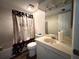 Bathroom with a vanity, toilet, shower and 'Paris' shower curtain at 62 Place Fontaine, Lithonia, GA 30038