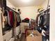 Spacious walk-in closet offering ample storage with shelving at 62 Place Fontaine, Lithonia, GA 30038