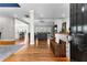 Inviting home entryway with hardwood floors that flows to the living room, dining room, and kitchen areas at 105 Leisure Trl, Peachtree City, GA 30269