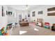 Bright playroom with ample natural light, neutral walls, and plenty of space for toys and activities at 105 Leisure Trl, Peachtree City, GA 30269