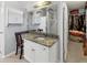 Bathroom vanity and mirror with views of soaker tub and walk-in closet at 1098 Berkley Se Dr, Smyrna, GA 30082