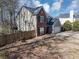 Charming two-story home featuring a brick facade, attached garage, and well-maintained landscaping at 1098 Berkley Se Dr, Smyrna, GA 30082