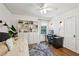 Bedroom with daybed, built-in shelving, and a desk with modern fixtures at 278 Midvale Ne Dr, Atlanta, GA 30342