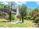 Landscaped backyard with decorative rock and green grassy area at 2922 Parkridge Ne Dr, Brookhaven, GA 30319