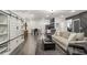 Finished basement with living room, dining area, luxury vinyl plank floors, and built-in storage at 2922 Parkridge Ne Dr, Brookhaven, GA 30319