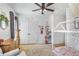 bedroom with hardwood floors, soft area rug, and ample closet space at 2922 Parkridge Ne Dr, Brookhaven, GA 30319