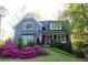 Attractive two-story home with inviting front porch and professionally landscaped front yard at 2922 Parkridge Ne Dr, Brookhaven, GA 30319