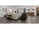 Finished basement living room with luxury vinyl plank floors, modern decor, and built-in storage at 2922 Parkridge Ne Dr, Brookhaven, GA 30319
