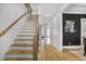 Elegant staircase with hardwood steps and modern railing, providing a stylish transition between floors at 2922 Parkridge Ne Dr, Brookhaven, GA 30319