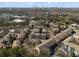 Scenic aerial view of a residential community, with townhomes and surrounding trees at 1029 Emory Parc Pl, Decatur, GA 30033