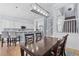 Open kitchen and dining area featuring a breakfast bar and seating for four and a dark wood dining table at 1029 Emory Parc Pl, Decatur, GA 30033