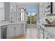 Stylish kitchen features white cabinetry, stainless steel appliances, and a view of the exterior at 1029 Emory Parc Pl, Decatur, GA 30033