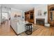 Elegant living room features hardwood floors, a fireplace, custom built-ins, and ample natural light at 1029 Emory Parc Pl, Decatur, GA 30033