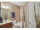 Neutral bathroom with a shower-tub combo, single vanity, and blue accents at 1907 Haven Park Se Cir, Smyrna, GA 30080