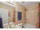 Bathroom with shower-tub, single sink vanity and decorative colorful shower curtain at 1907 Haven Park Se Cir, Smyrna, GA 30080