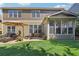 Backyard with an umbrella, patio, and sunroom addition enhancing the home's exterior at 1907 Haven Park Se Cir, Smyrna, GA 30080