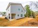 View of home's siding, backyard and exterior patio at 4700 Blake Loop, Atlanta, GA 30349