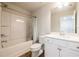 Bathroom featuring a shower-tub combo, a toilet, and a vanity with sink at 4700 Blake Loop, Atlanta, GA 30349