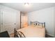 Cozy bedroom featuring a black metal bed frame and neutral walls at 4700 Blake Loop, Atlanta, GA 30349